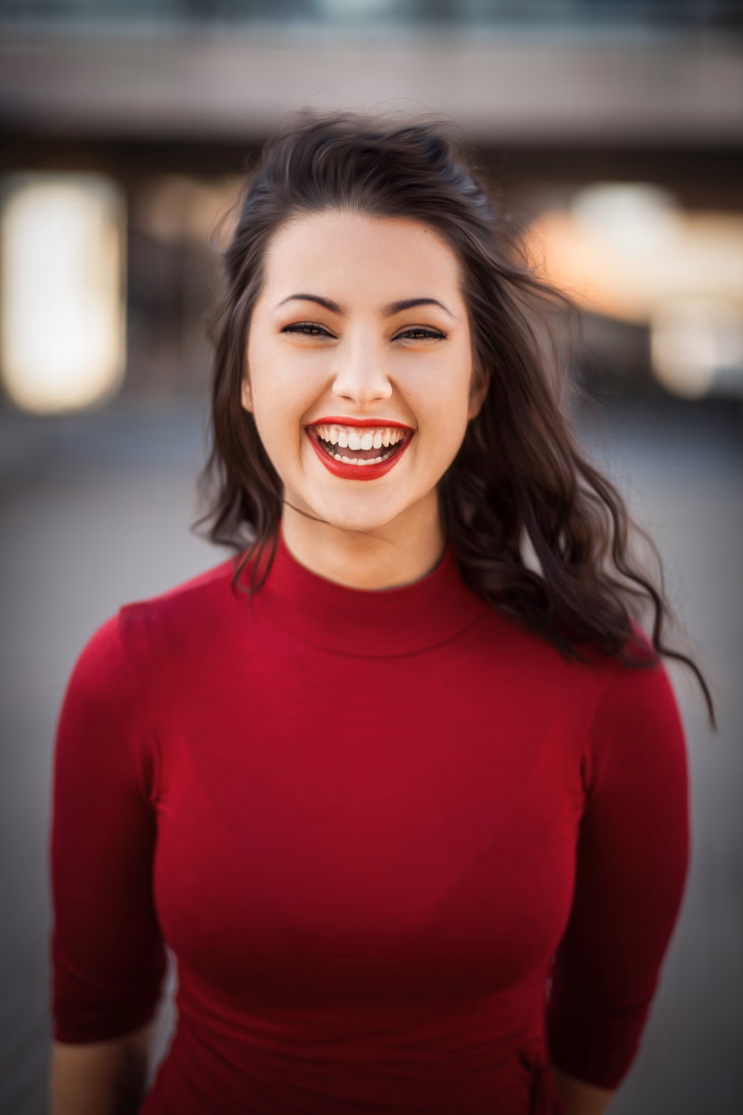 Woman in red shirt smiling