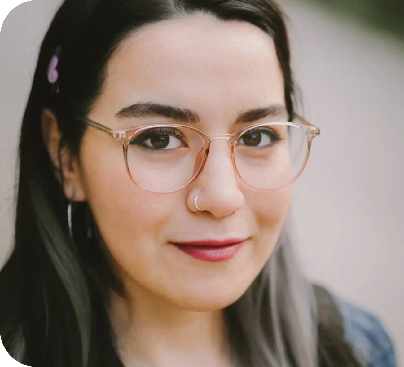Woman with glasses smiling